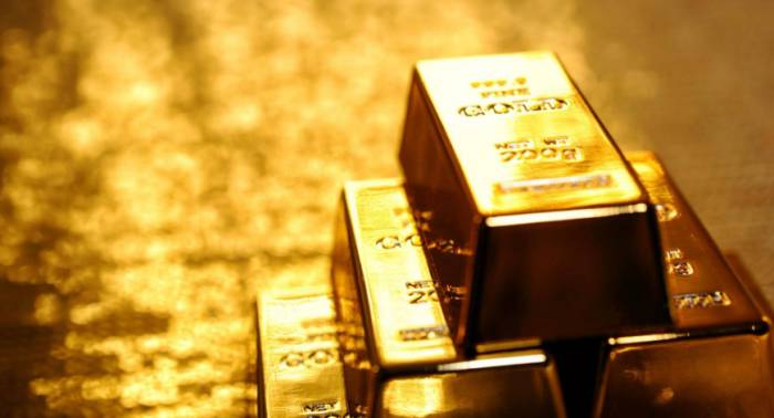 Latest: Fed Chief Signals Rate Cut, Gold Soars